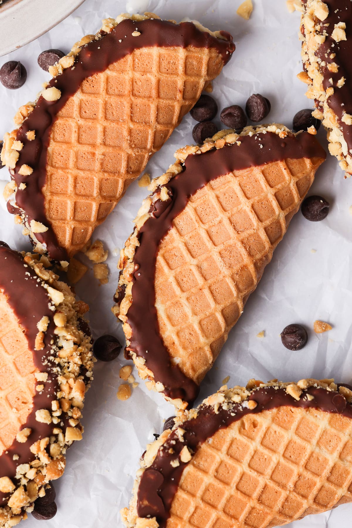 homemade ice cream tacos shells on parchment paper.
