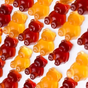 yellow and red gummy bears lined up.